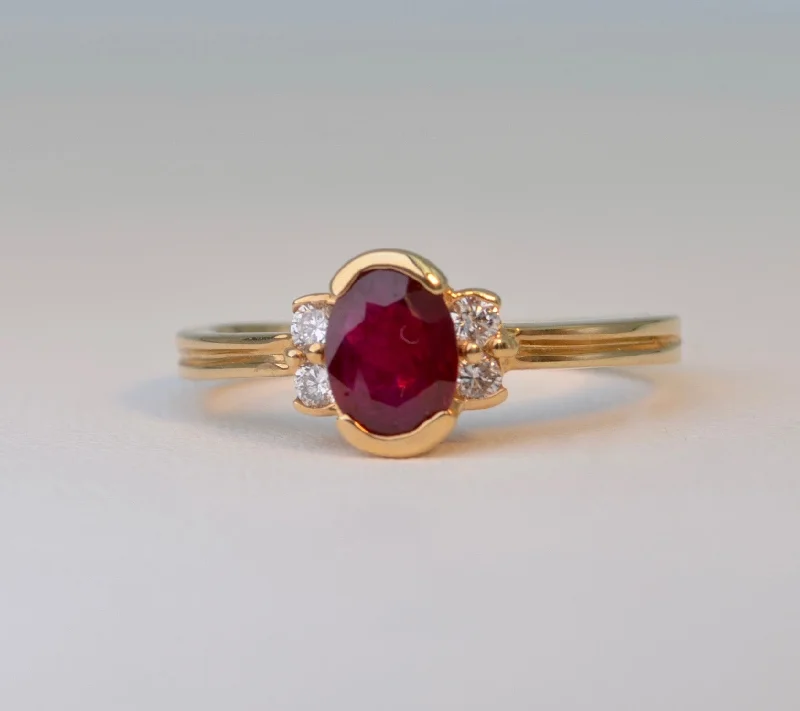 Simple Custom Wedding Bands For Grooms-14K yellow gold ring with one center oval Ruby and four side Diamonds