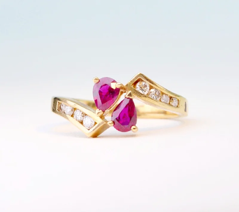 Unique Wedding Rings For Romantic Brides-14K yellow gold ring with 2 pear-shaped Rubies and 8 side Diamonds